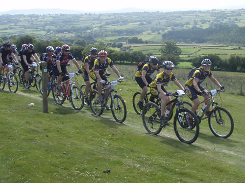 The West Drayton MBC\Beyond Mountain Bike girls leading from the front, Theo trying to hang onto their wheel!