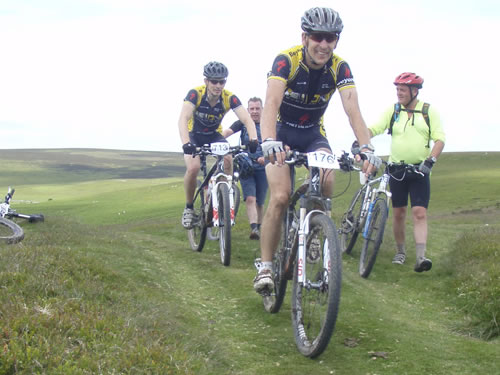 Around the 35km point, the 45km group was caught by the 'racers' doing the 75km route.  Go on lads!  This is Chris leading from Stephen although the order would be reversed just before the finish.